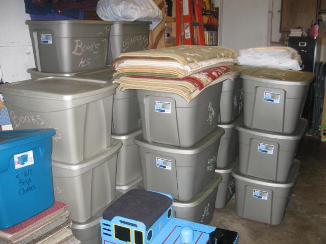 Storage tubs in my parents' garage waiting to be shipped.